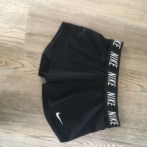 black Nike athletic shorts